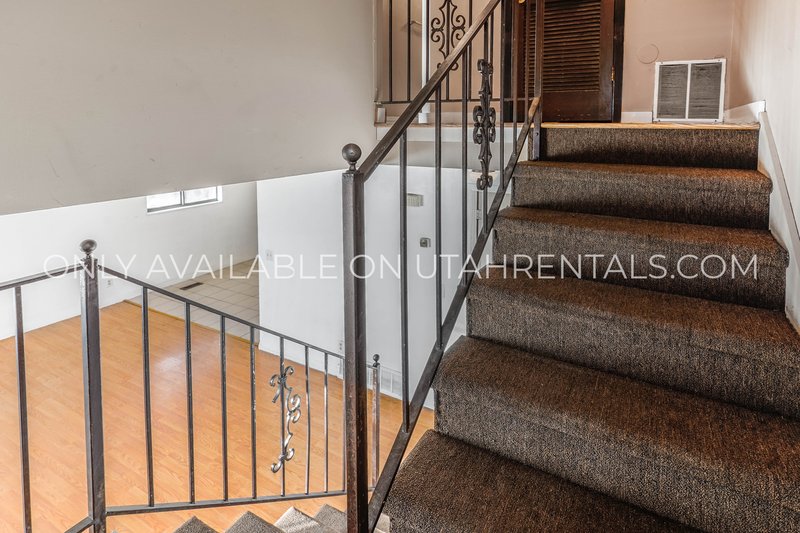 Multi-Level 2 Bed in Midvale! Minutes to I-15 + Carport + Pet Friendly property image