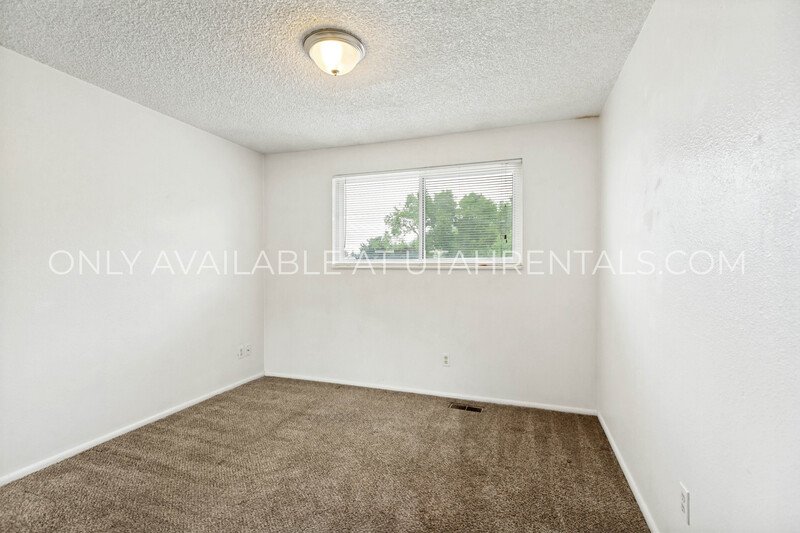 Beautiful 4-Bed, 3-Bath Orem Home with Spacious Yards & Decks property image