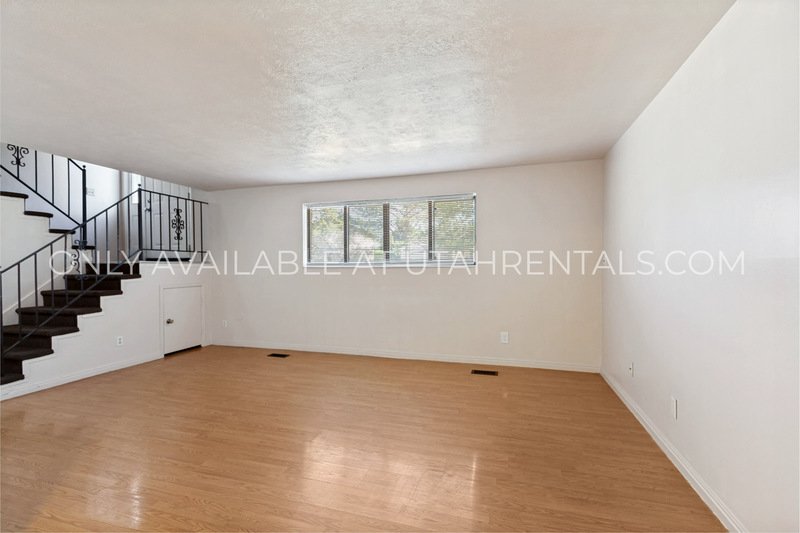 $600 OFF!! Multi-Level 2 Bed in Midvale! Minutes to I-15 + Carport + Pet Friendly property image