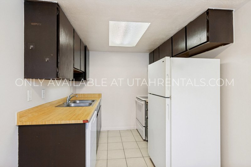 $600 OFF!! Multi-Level 2 Bed in Midvale! Minutes to I-15 + Carport + Pet Friendly property image