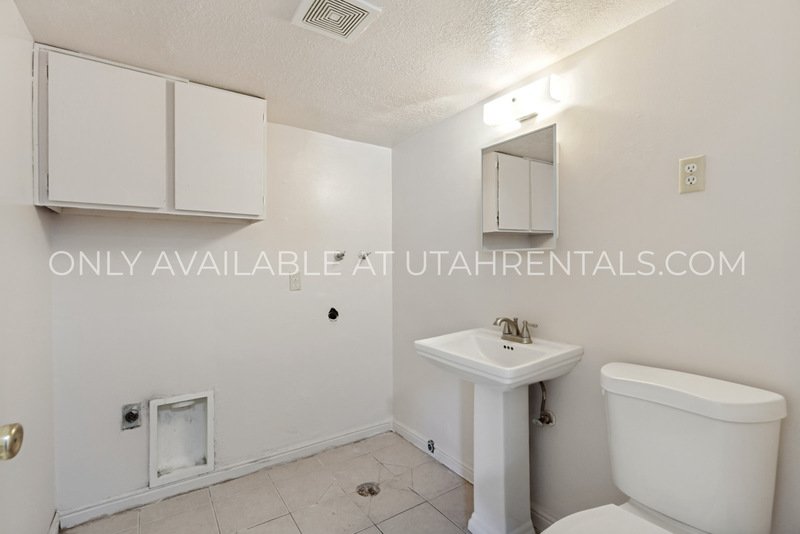 $600 OFF!! Multi-Level 2 Bed in Midvale! Minutes to I-15 + Carport + Pet Friendly property image