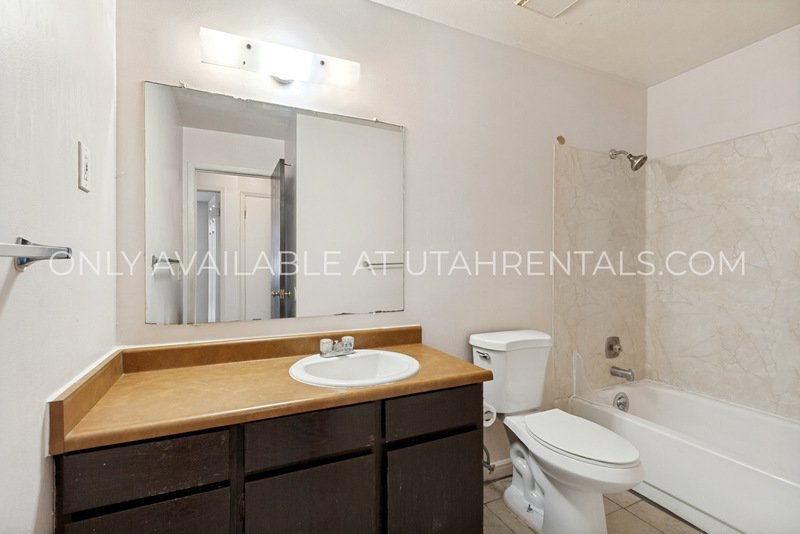 $600 OFF!! Multi-Level 2 Bed in Midvale! Minutes to I-15 + Carport + Pet Friendly property image