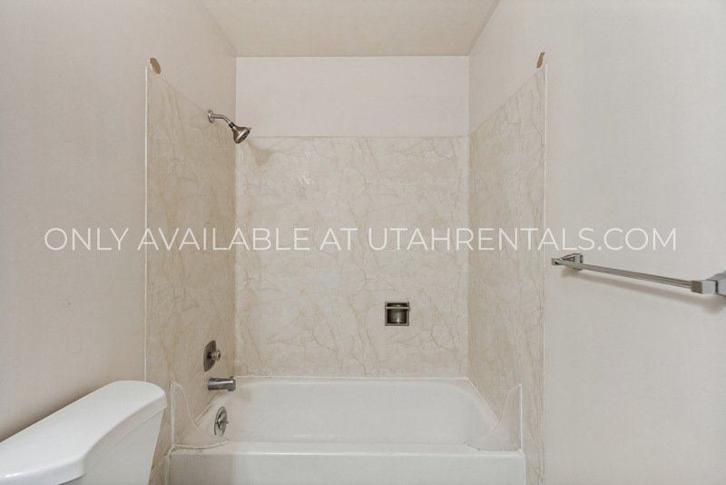 $600 OFF!! Multi-Level 2 Bed in Midvale! Minutes to I-15 + Carport + Pet Friendly property image