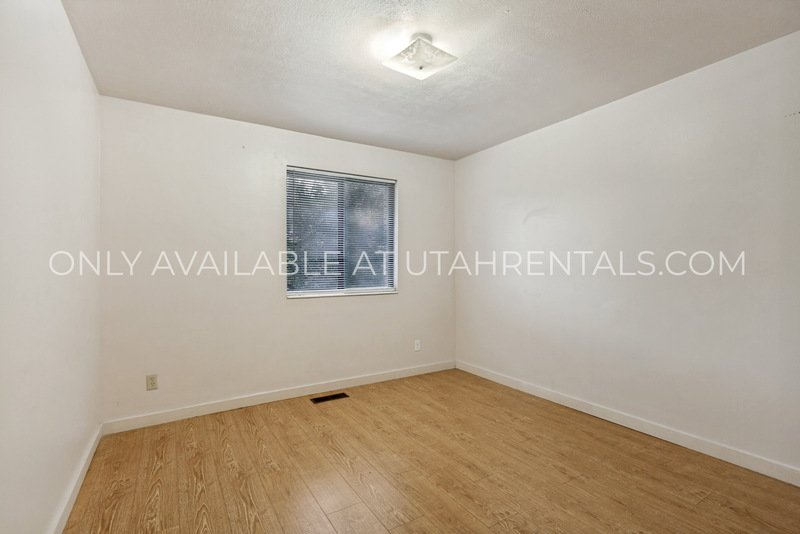 $600 OFF!! Multi-Level 2 Bed in Midvale! Minutes to I-15 + Carport + Pet Friendly property image